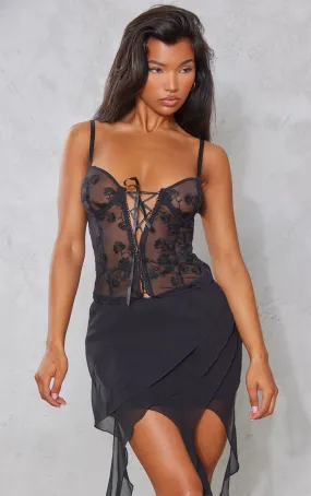 Corset en mesh brodé fleuri noir à lacets