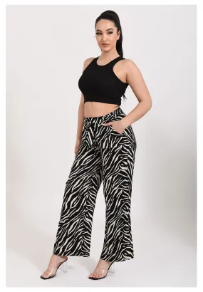 Pantalon fluide imprimé zebre noir et beige tendance et pour femmes